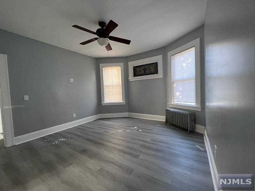 Welcome To This Renovated Three Bedroom 1 Bathroom 1st Floor Apartment. Features a Newer Kitchen, Bathroom, Flooring and Freshly Painted. Tenant is Responsible For Utilities. Application, Credit Check, Proof of Income and Interview Required.