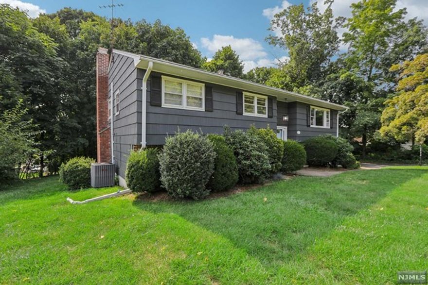 Very nice home available immediately. New kitchen offers white shaker cabinets, stainless steel appliances, and quartz countertops. Beautiful hardwood floors( just redone). The lower level offers family room w/FPL, nicely sized office with built-ins. Very nice private backyard, great location on quiet street, and only minutes away from Route 208, shopping and restaurants.