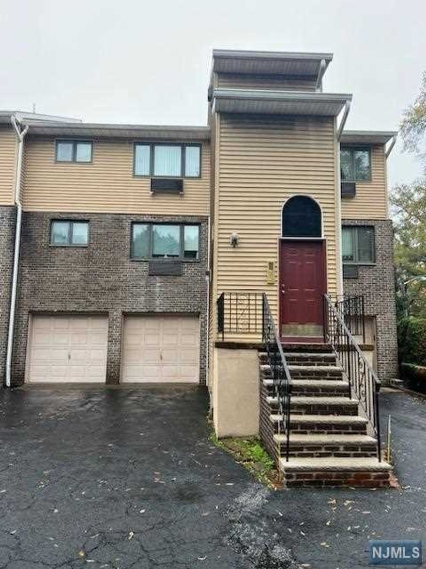 Lovely and well maintained 2 bedroom, one bath condo. Spacious living room, dining room with large kitchen. Attic with pull down stairs for useable space. Includes garage with ample storage room with washer & dryer. Easy access to transportation and shopping. Pet allowed under 20lbs. To be sold as is condition. Make this your new place to call home!