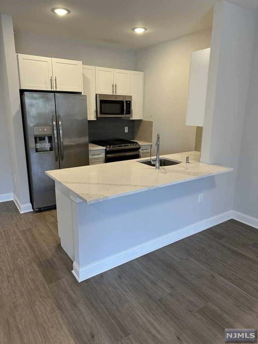 One outdoor parking spot included in rent! 40 Park features modern units with spacious floor plans & high end finishes. Some highlights include: beautiful modern kitchens with stainless steel GE appliances, full kitchen island, wood floors, large washer and dryer in each unit, master baths with large walk-in showers and many units with views of the creek, tennis courts and high school fields! Blocks away from the train for easy access to New York. 25-30 lb pet limit (pet fee applies). Within blocks to all Park Ridge has to offer including brand new stores and restaurants. Tenant pays for utilities. Less than 5 minutes from the brand new Shoppes at Dipiero Farms - featuring Wegmans, Chipotle, Starbucks and much more. Available immediately! Non-refundable $250 move-in fee due at lease signing.