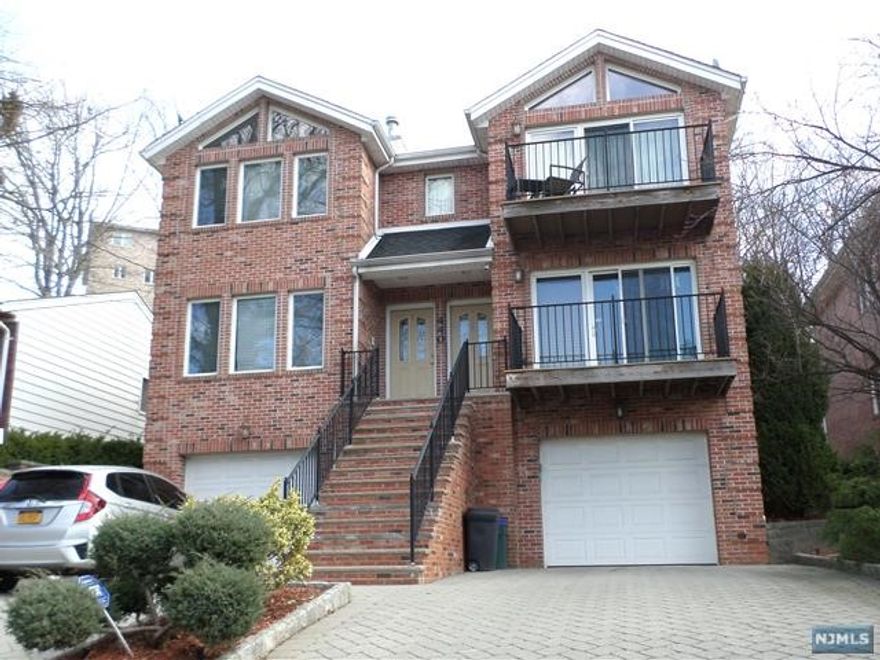 RENT IN THIS SPECTACULAR HOME! THIS 1ST FLOOR UNIT FEATURES ALL LARGE ROOMS, CENTER AIR, CENTRAL VAC, GRANITE EAT-IN-KITCHEN WITH DOORS TO PRIVATE YARD. WASHER/DRYER IN UNIT. DRIVEWAY PARKING FOR TWO OR MORE CARS. CLOSE TO ALL NYC TRANSPORTATION, SCHOOLS AND CENTER OF TOWN.