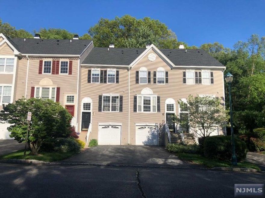 This Franklin Crossing townhome can be yours! First floor has your eat-in kitchen w/SS appliances, renovated powder room, high ceilings, hardwood floors, open concept DR & LR, french door to a private patio looking over yard w/scenic view. Second floor has a large primary suite w/vaulted ceilings, double closets and master bath. You can find the 2nd bedroom, full bath and laundry room also on the 2nd floor. The finished lower level is spacious and has potential for whatever you may desire w/ an entry to the attached oversized one car garage. Franklin Crossing offers a pool, tennis, clubhouse and playground. Close proximity to shopping, parks, hiking, houses of worship and NYC transportation! Low taxes and HOA fees! Top rated Mahwah schools! You do not want to miss this!