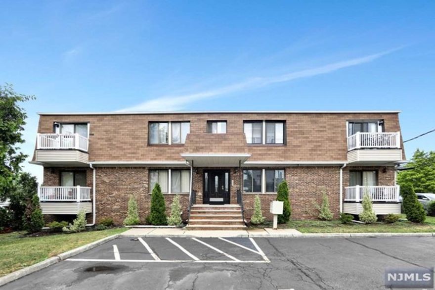 Beautiful and spacious first floor end-unit condo with two bedrooms, two full bathrooms, balcony off master bedroom, washer and dryer in unit, ADT security system, two assigned parking plus additional for visitors. Prime location for commuters, minutes away from Watsessing Train Station. Walking distance to bus stations, restaurants, pharmacies, supermarkets, and shops. The building has new vinyl siding and balconies. Very well-maintained building with low HOA fees.