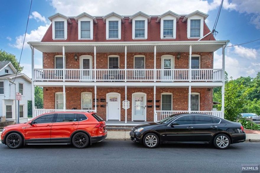 Completely renovated 1 bedroom, 1 bathroom first floor unit in beautiful vintage Victorian building. BATHROOM WILL BE UPDATED BEFORE CLOSING. Unit features spacious living room/dining room combo, kitchen, large bathroom w/stall shower, laundry/utility room, extended hall closet & small porch. Updates in last 3 yrs incl. all new floors, new front door, new porch, new furnace & high hat lighting, customizable closets, & new W/D. 1 Assigned parking space in back of building. All you have to do is move in. Pets allowed! Close to Rockaway Mall, Routes 46 & 80, as well as park and soccer field! LOW TAXES AND HOA!