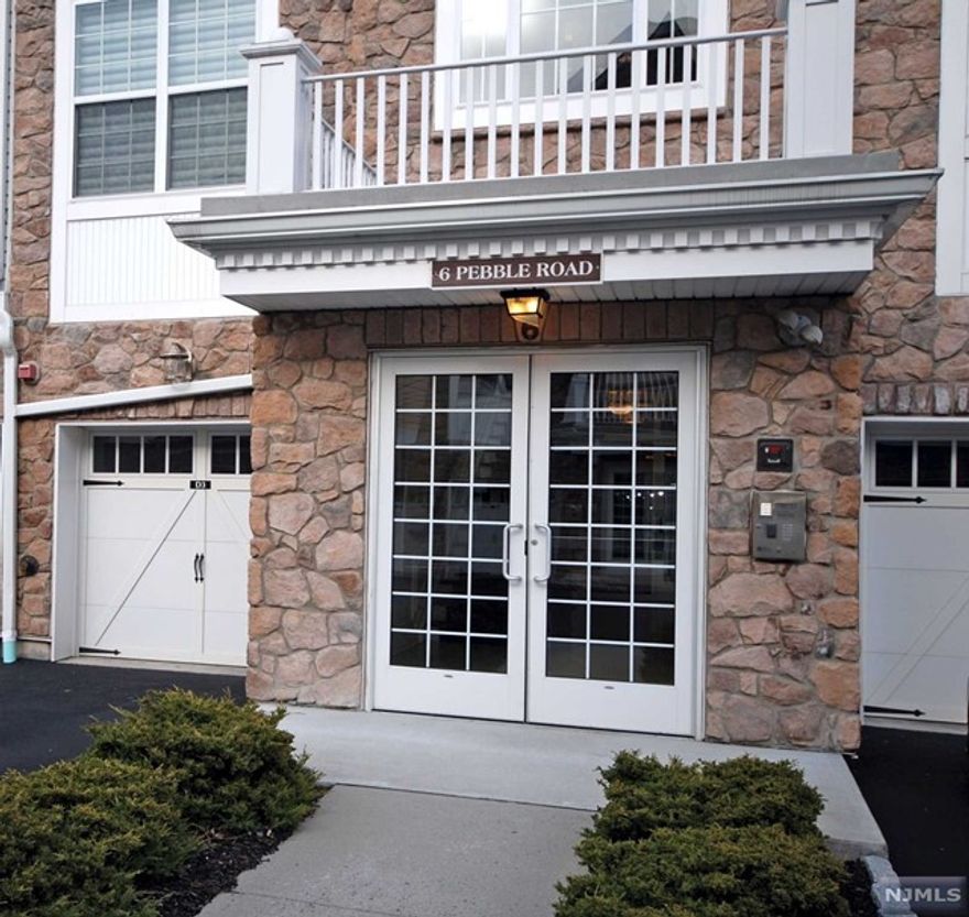 Upscale BEGONIA II with the upgrades & finishes you desire! Only 8-years old, located in one of the newer buildings and truly turnkey. An ideal floor plan with an open feel offering privacy between the bedrooms. The kitchen shines with light cream cabinetry paired with the vibrant colors in the granite (center island & countertops). An impressive primary bedroom suite w/large walk-in closet & luxurious bathroom. Features include hardwood floors, custom window treatments, wood trims, specialty tiles, private garage w/storage room and balcony with a peekaboo view of the NYC Skyline. Resort style living with an outstanding 25,000 sq. ft. clubhouse w/indoor/outdoor pool, tennis, pickleball, putting green, fitness center, card rooms/Mahjong, clubs, activities & more. Bordering the town of Montclair with terrific restaurants, theaters & boutiques. This home has been meticulously cared for by the original owners and only used seasonally. Live comfortably in this premier gated community!