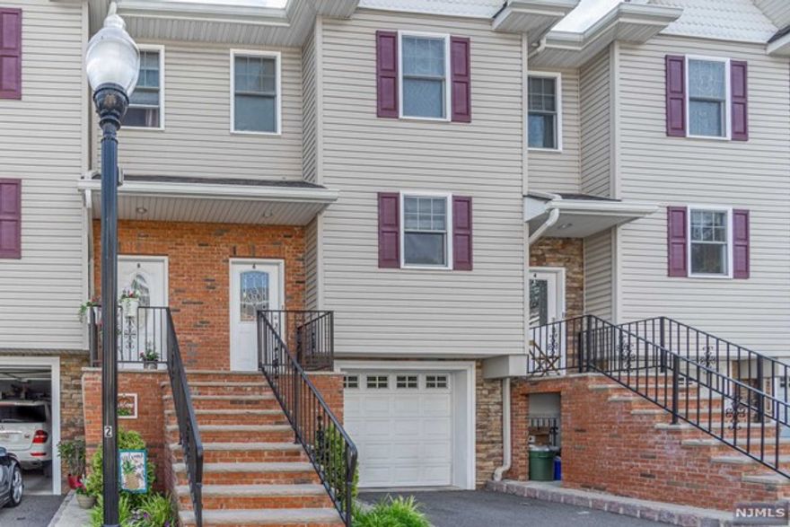 Beautiful newer community townhome! This unit features an entry foyer, large living room w/gas fireplace, dining room, fully equipped modern kitchen with granite, and maple cabinetry, and a powder room on the first floor. The sleeping level offers, a large master bedroom with two closets featuring custom built shelving and a master bath, an additional bedroom with a private full bath and laundry. The grade level offers a two car tandem garage. Additionally, there are newly refinished hardwood floors, central A/C, and is located 3 blocks to NYC Transportation. Landlord requires, full application, 3-bureau credit report, proof of identity, proof of income for all adult occupants. and reserves the right to ask for additional documents. Tenant is responsible for Realtor Fee equaling 1 month's rent.