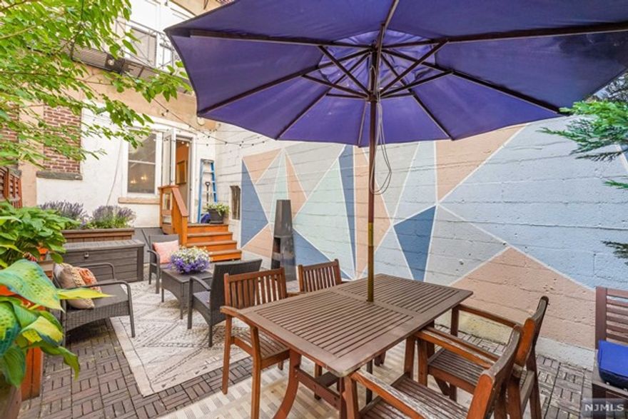 Welcome to your charming one-bedroom condo in Hoboken! As you step inside, you're greeted by an open-concept living area that seamlessly combines the living room, dining space, and kitchen. The layout maximizes space and creates a bright and airy atmosphere. Large windows adorn the walls, allowing natural light to flood the entire space and provide a warm ambiance throughout the day. The open design ensures a seamless flow between the spaces, creating a sense of unity. The kitchen is well-appointed and equipped with modern appliances, sleek countertops, and ample storage space. The bedroom, located at the front of the condo, offers a tranquil retreat. It is generously sized with a spacious closet to store your belongings. The large window in the bedroom ensures plenty of natural light and creates a serene atmosphere. Step outside from the kitchen, and you'll find a charming outdoor space that's exclusively yours. The backyard is a sanctuary, offering a nice retreat.