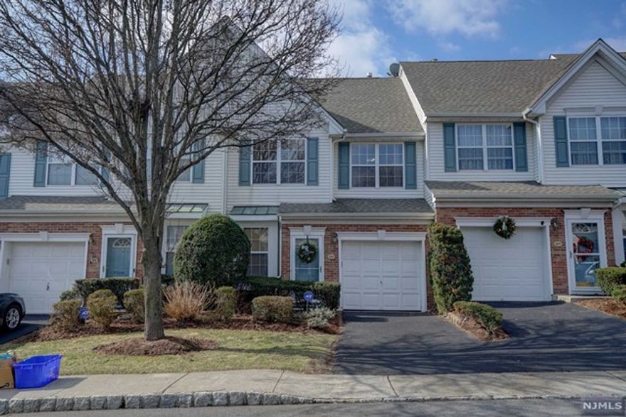 Welcome home to this beautifully updated 2 bedroom, 2.5 bathroom Buckenham unit in the highly sought after Cambridge Height development. Enter into the unit to the foyer leading to the spacious living room, dining room to open modern kitchen with granite counters and stainless steel appliances with sliders leading to the patio, powder room. The 2nd floor houses both bedrooms, main bath and study for complete privacy. The master bedroom has a spa-like bathroom and large walk-in closet; laundry room. Features include California Closets, solid oak doors, gorgeous hardwood floors throughout, gas line on patio, spacious 1 car garage. The complex amenities include an in-ground pool and tennis courts. Conveniently situated near all major highways, shopping and schools. Easy access to NYC.