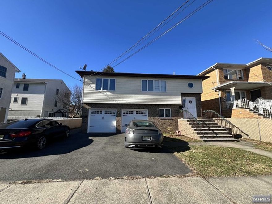 Gound level, no stairs, 2 bed, 2 full baths, eat in kitchen, cental a/c, new laminate floors, new stove, sink faucets, dishwasher, baseboard heat, garage, garage door opener, driveway one car parking, laundry hookups, sliding doors to patio. Close to train station, all major highways, shopping