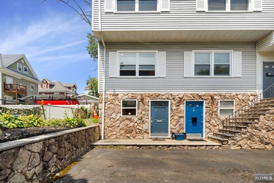 This beautifully updated 2-bed, 1 full bath & 2 half bath home offers an ideal combination of style & accessibility. Spanning three levels, the open floor plan is enhanced by stylish updates throughout, creating an inviting atmosphere. As you enter, you're greeted by a spacious mudroom/entry foyer that leads to a cozy den, perfect for a home office or relaxation space. The main living area flows seamlessly from the updated kitchen to a private deck, ideal for outdoor entertaining. Enjoy the convenience of an in-unit washer & dryer, making laundry days a breeze plus 1 deeded parking space. The location is unbeatable, just minutes from downtown Irvington on Springfield Ave, where you can find a variety of shopping & dining options. Commuters will appreciate easy access to major highways like Route 22, I-78, & the Garden State Parkway. Only a quick drive to Maplewood downtown, Short Hills Mall & NJ Transit train stations. Don't miss the opportunity to make this charming home yours!