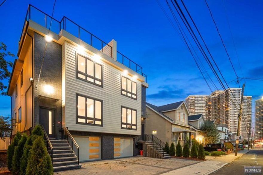 New Construction Townhouse with Rooftop Terrace in Cliffside Park's most convenient neighborhood. South Facing on a quiet street - This townhouse spans 4 levels featuring approx 3000sf - Most desirable open layout - plenty of natural light - Living Room with Gas Fireplace - Designer Kitchen with Quartz countertop, sliding glass doors to private terrace - Primary Bedroom with a spacious spa like Primary Bathroom plus 2 additional spacious bedrooms and plenty of closet space - Relax above it all on your rooftop terrace. Ground floor features attached garage, family room, full bathroom and entrance to private back yard. The location is ideal for commuters with easy access to express public transportation, Ferry, George Washington Bridge, and Lincoln Tunnel. Steps from Abbott Blvd, ideal for walking or biking. Anderson Ave, Cliffside Park's downtown district, is walking distance and features shopping, cafe's and restaurants. Come take a look!