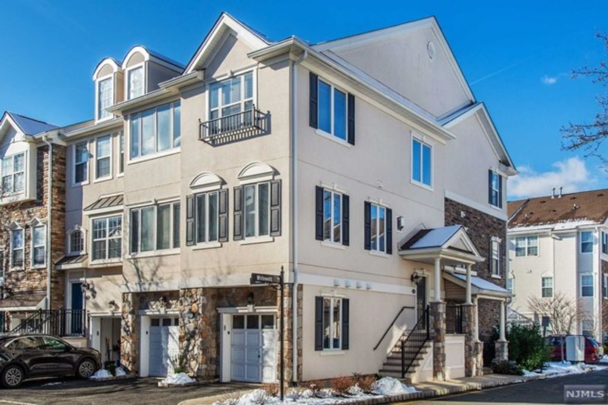 Bright & Sunny End Unit with approx. 1489 sq.ft of living space. Features:2 Bedrooms, Master Bath w/his & her sinks. Kitchen, Dining Room & Living Room w/gas fp. Harwood floors thru out, Laundry conveniently located on 1st level w/half bath. Brand New HVAC System installed 12/23. Amenities: Gated, Pool, Exercise Room & Clubhouse. Minutes away from NYC Transportation & very pet friendly.