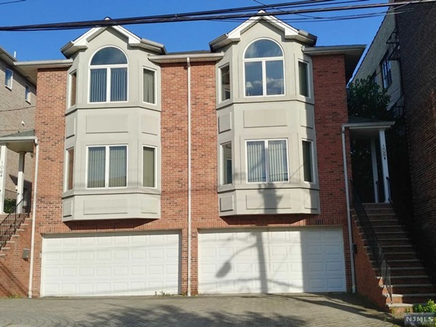 19 YEARS OLD ALL BRICK DUPLEX IN A GREAT LOCATION. LONG ONE BLOCK FROM BROAD AVE & Close to RT46. HARDWOOD FLOOR THROUGHOUT. LIVING ROOM W/Fire Place. CATHEDRAL CEILING W/Skylights. Spacious EAT-IN-KITCHEN w/granite counter top. MBATH W/JACUZZI, 2 WALK-IN CLOSETS IN MASTER BEDROOM. CENTRAL AIR, 3-ZONED HEATING SYSTEM, AND CENTRAL VACUUM. FULLY FINISHED BASEMENT W/Full Bath & SEPARATE ENTRANCE. LOVELY DECK AND PRIVATE BACKYARD. 2 CAR GARAGE. SHORT WALKING DIST TO NYC TRANSPORTATION. CLOSE TO GWB AND ALL MAJOR HWS(R46,I95) AND SHOPPING CENTER.