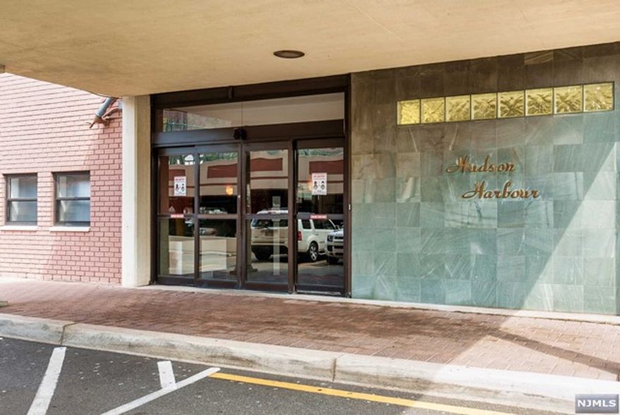 Exceptional 2-bd Penthouse in luxury high-rise with the most spectacular view of Manhattan, GW Bridge, and Hudson River. Huge LR w/hardwood floors, high ceilings, huge skylight and 60 ft terrace. Beautifully renovated unit with custom built kitchen and top-of-the-line appliances with granite counter tops and plenty of storage space including a wine cabinet. Luxury 2.5 marble bathrooms with custom designed cabinets, jacuzzi. Unit has its own washer/dryer. All utilities are included in monthly maintenance: heat, water, electricity along with pool, gym, tennis courts, playgrounds for kids, cable, hi-speed internet, 24-hour doorman, security, parking space. Breathtaking walkway along the Hudson River, easy commute to NYC. A bus stop is across the street, walk or shuttle to ferry. Close to Whole Foods, Trader Joe's, shops, restaurants, schools, Edgewater Park. This is one of the best alternatives to NYC living and truly a must see! Building is not FANNIE/FREDDIE/FHA approved.