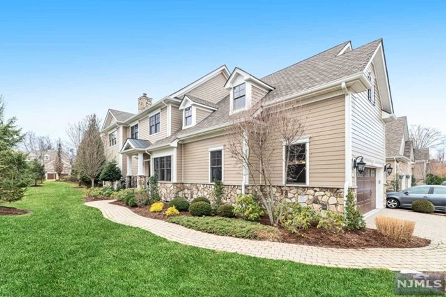 Welcome to Cherrywood! A sought-after complex in River Vale known for its unmatched attention to detail. This 7-year young 2,858 sq ft. luxury end unit is one of only a few in the complex that offers a 1st fl.primary En-suite. This sun filed 3-bedroom 2.5 bath townhome has an open concept layout W/Formal dining room, granite kitchen overlooking the great room with soaring ceilings and gas fireplace. 9 ft. Ceilings and wood flooring throughout. The second level offers 2 massive bedrooms, full bath with double sinks, home office and a fabulous loft area for additional space to use as you please. The basement is full and finished with 10' ceilings, wood floors, and full bath plumbed and ready for your finishing touches. Maintenance-free living & premier location nestled between Lake Tappan and the River Vale country Club and golf course; all within 20 minutes of NYC. Luxury details include Pella windows & doors, Maintenace free deck, gas line to grill, central vac, & 2 car garage!