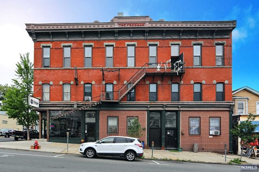 Opportunity of a life time to own The Freeman Building, Just under 20k sq ft, including full basement. Building was once used as Kearny's first post office. Built by the first postmaster general Mr Freeman. Theater was once the first Republican Hall. In 1920's part of the building was used as Town of Kearny court house. The theater was once the half penny theater. Unit- 1a. Aprox. 1500 sq ft with 400 sq ft of separate basement storage. Unit 1b Aprox 1800 sq ft. (Art Studio) Unit 1c Aprox 1500 sq ft. (Art studio) Unit 2a aprox 800 sq ft. (Make-up studio) Unit 2b aprox 1800 sq ft. (Art Gallery) Unit 2c 700 sq ft. (Apartment) Unit 2d aprox 1200 sq ft. (Apartment) Unit - 3a, 3b ; just under 5000 sq ft with original 24 ft tin ceilings and original hardwood floors. Original stage. There is also a kitchen aprox 1500 sq ft with 16 ft tin ceilings and hardwood floors. The ceiling has been fully insulated with blown cellulose and a new roof. To much to mention call for details.