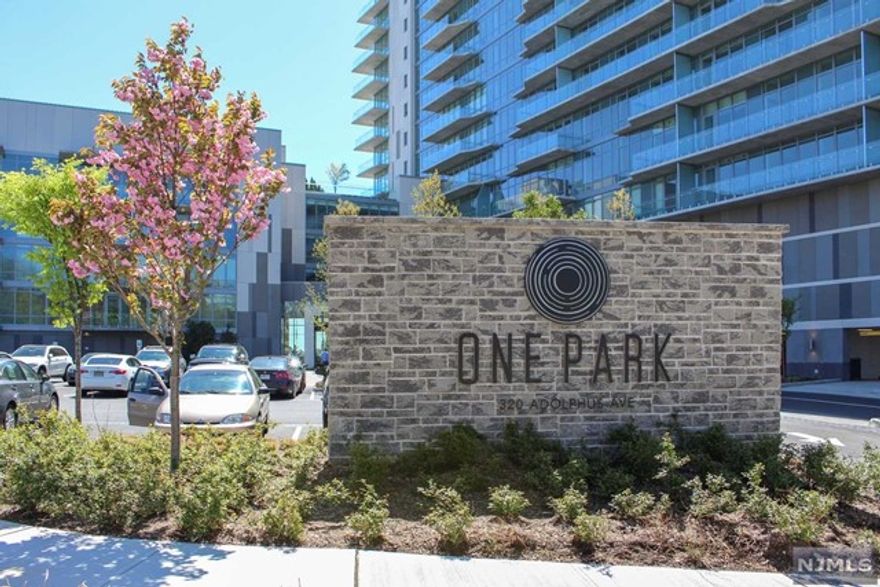 Premier Unit at One Park - Absolutely Stunning South Facing Manhattan views down the Hudson River! Key Features include: Gas Thermador Range Cielo quartzite counters & backsplash, large island, dining room, living room, private outdoor balcony, master suite with walk in closet and ensuite bath featuring soaking tub, separate shower and kohler finishes, additional bedroom and full bath. Unit also features wide plank white oak hardwood flooring, high ceilings and energy efficient Daikin HVAC system. One Park's Unmatched 25,000SF of amenities include indoor pool, rooftop deck, state of the art fitness center, resident lounge, children's playroom, Unitronics automated parking garage, 24 hour concierge & more! Convenience, Luxury, and views all in a quiet neighborhood