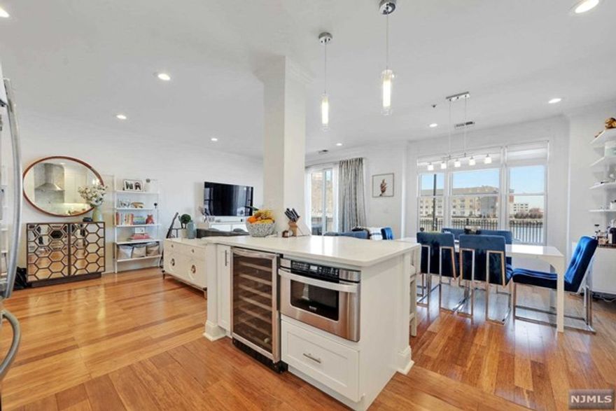 A completely redesigned & customized home with all of the designer touches & details in a North-facing 2BR/2.5BA, 1,444sf Bergen Model townhouse with NYC/Hudson River views. Exceptional design, this home has been renovated w/ the finest finishes including wood flooring; brand new kitchen with custom cabinetry, new countertops, marble tile backsplash, wine cooler; & recessed lighting throughout. 1st floor has open dining/living areas & a patio. On the upper level, a primary ensuite that boasts room for king-size furniture then moves onto a beautifully designed BA w/ a soaking tub, separate shower, double vanities, redesigned WIC with custom built-ins & private balcony overlooking NYC/Hudson River. Spacious 2nd BR & 2nd BA. Crown moulding, chic light fixtures, custom closets, Nest Thermostat, & Lutron light switches. Located in Jacobs/Bulls Ferry, this community accommodates 2 pools, Jacuzzi, 24hr security, free shuttle to/from Ferry & easy access to NYC via bus across the street!