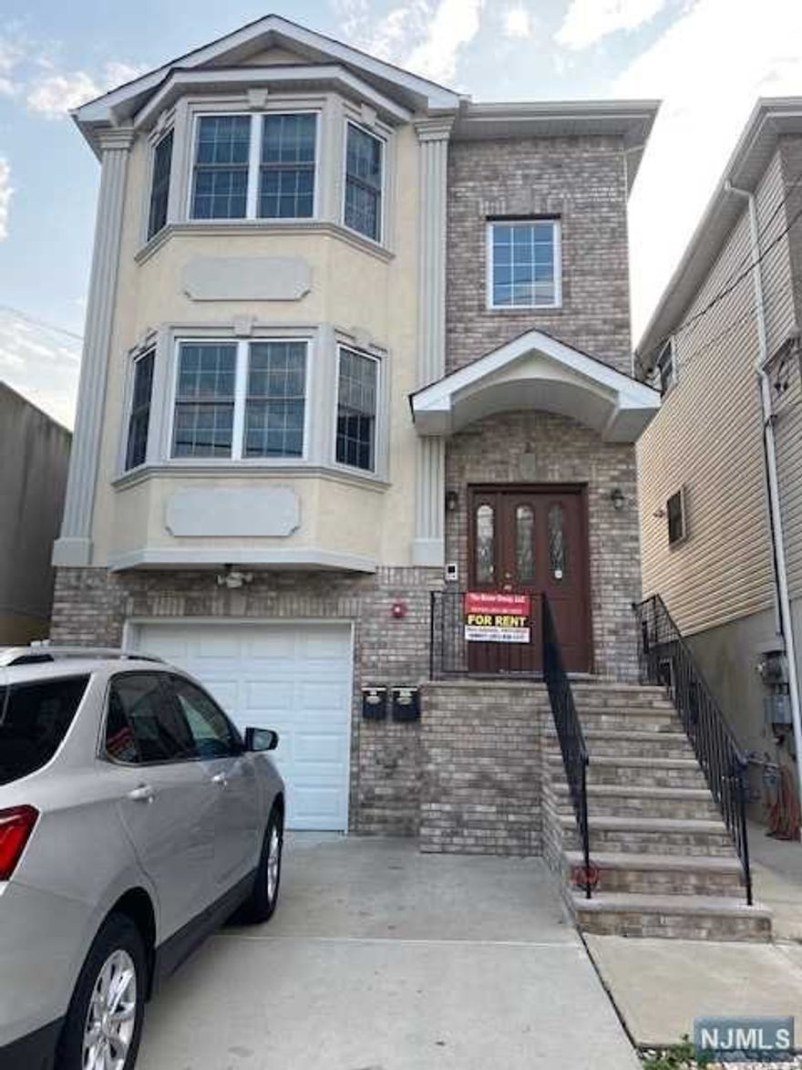 Beautiful 1st floor apartment. 3 Bedrooms, 2 full baths, huge eat in kitchen with granite counter tops and living room. Master bedroom included a double wide walking closet and it's own private on suite bath. Includes 1 parking space, use of backyard and laundry room. Walking distance to the PATH, close to Rutgers, NJIT and close to all major highways. Landlords requires income verification, background check an interview. 1 months security deposit and $1150 broker's fee. small pet ok. Available 6/01/2022