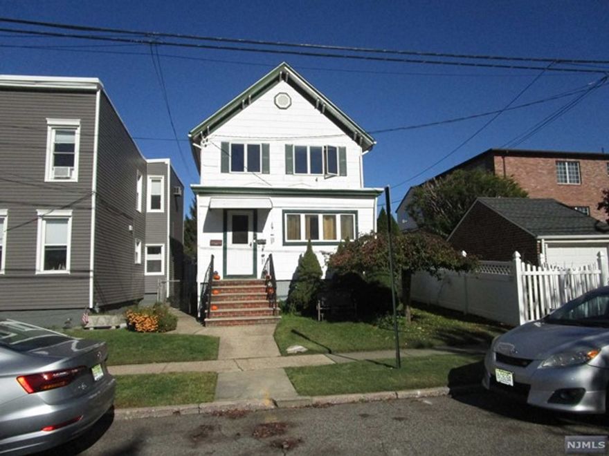 LOCATION!! Two blocks to the NYC train station. Nice two-bedroom, one full bath second-floor apartment with freshly painted walls, new floors, large living room, limited use of yard, some storage in attic, and laundry rm in the apartment.