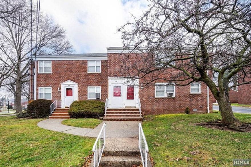 Updated garden home in the heart of the prestigious Maple Hill area adjacent to Maywood border. NEWer open kitchen with large breakfast bar. NEWer ceramic tile bathroom, hardwood floors. Steps to open park area and laundry room. Rent includes heat, hot/cold water. Appx 1 block to NYC EXPRESS bus; near local bus. Close to downtown Maywood.