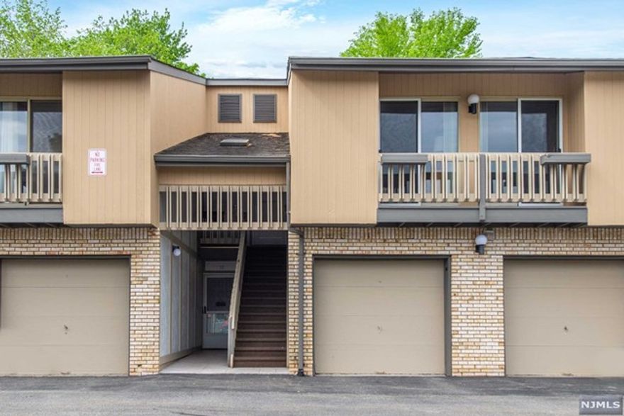 Sunny & spacious recently renovated Scenic Hill condo! This upper unit has great "flow" w/its open floor plan. Enjoy the renovated gourmet kit w/granite countertops & breakfast bar that opens to the adjacent DR & LR w/gas FP. The generous den w/vaulted ceiling provides room for a home office, rec room, or home gym. Enjoy the serenity of the private rear deck accessed by sliders in both the office & DR. The expansive primary bedroom w/renovated en-suite bath feats sliders to an outdoor balcony & has tons of closet space; a generous walk-in & a 2nd double closet. The 2nd sunny BR has a large double closet, sliders to the balcony & access to the renovated hall bath. An in-unit washer/dryer makes laundry a breeze! Enjoy resort living in this lovely community featuring an outdoor heated pool, tennis courts, beautifully manicured grounds, walking paths, clubhouse w/ gym & common rooms, and a playground! Minutes to so many activites incl. the zoo & NYC trans.