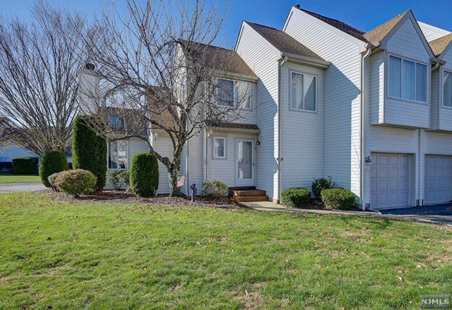 This desirable end unit in the heart of Montville features an eat in kitchen, living room with a gas fireplace and cathedral ceiling, separate sitting area and a formal dining room. The second floor features a huge master bedroom suite with a vaulted ceiling, large master bath and plenty of closet space. The second bedroom has it's own private bathroom, a closet and a second walk in closet that could be used as an office. The laundry is located on the second floor for added convenience. There are stair lifts that can be included in the sale or removed (buyers choice) The full basement can be finished for extra living space or used for storage. There is also a 2 car garage attached to the unit. Amenities include the pool, clubhouse, exercise room, playground and guest parking. Access to Montville train station and major highways.