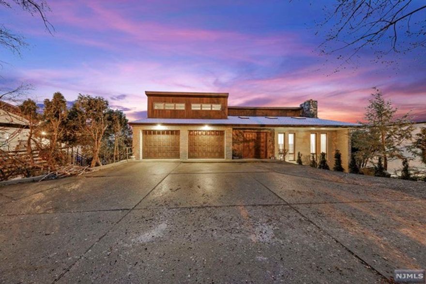 Looking for a waterfront house with unobstructed panoramic views of the GWB, Hudson river, & NYC skyline from almost every room? 16 Vista Ln is located at the end of a cul-de-sac in Edgewater's most prestigious community, The Colony. Custom built with 7.5 tons of steel, the integrity of this structure is impressive by any measure. Features include a 3 car garage with a workshop loft, a double height living room, lounge/bar w/ wine cellar & dance floor, 6 skylights, and beautiful Pennsylvania Mica throughout.... The video tour for this home is comprehensive, and worth watching. Paid quarterly *Maintenance $1692.80 *Land tax $1334.25 *House tax $7322.00 **CO-Op Attorney $950 + Transfer Fee 1% of the sale price + Application Fee $500 + credit check $250 + stock purchase $1,300