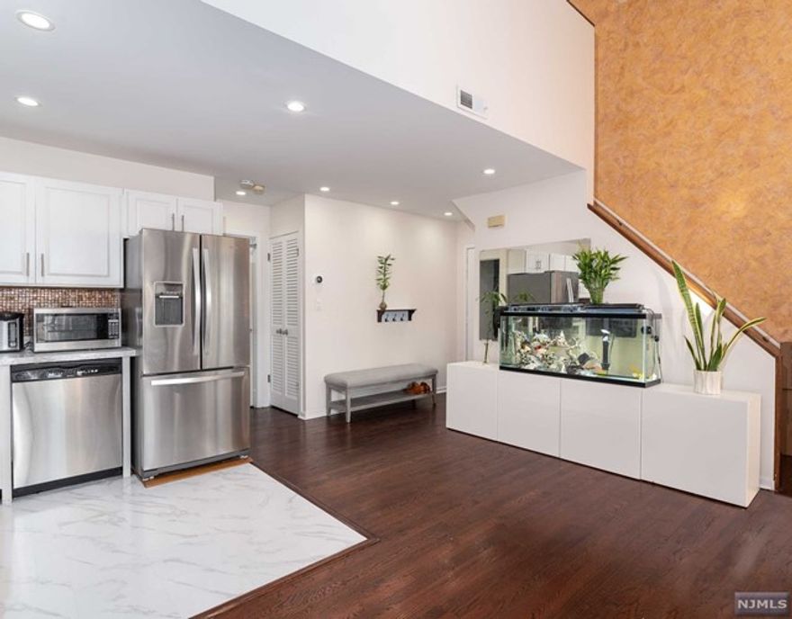 Oversized one bedroom condo in a great area of Little Ferry. Whether you are starting out or downsizing, this unit has so much to offer. Large loft area upstairs is perfect for a guest room or work from home space. The sliding glass doors allow the natural light to pour in through the living and dining room area. The front or bedroom balconies are a great place to enjoy your morning coffee or take in the crisp fall air. Close to delicious restaurants, a local brewery, shopping, and easy NYC access and public transportation.