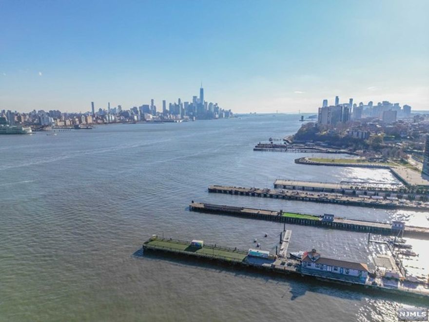 Rarely available! Welcome to 1103 at Constitution Ct. overlooking the Hudson River Harbor. This unit is a North East corner in a doorman building that has views of the NYC skyline and the River from every room! Location boast of a local park. Shopping nearby. Owners can get pool and garage services through Ship Yard Associates 2 pets under 40 lbs. would also be welcomed here. Laundry in unit. This unit was freshly painted, floors polished and new flooring in the kitchen. Just pack and move for a fresh start in the New Year! Enjoy roof top pools with annual fee and the gym while a resident of the building, see Ship Yard for details. Exercise room in building and 4th floor out door common area. New windows with screens and 2 newer heating units replaced approx. 3 years ago. Must see, feels larger than it looks in the photos. Check out video too!