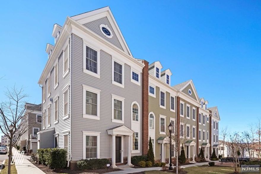 Situated on a corner unit, this 4BR/3.5BA home conveys modern elegance in a culmination of colonial style and urban mystique. Once inside, you find 3 levels of form and function. Entering the 1st FL, you note a traditional staircase, a BR w/attached bathroom, 2-car garage & closet space. Explore the entertainment-ready main floor to discover an open floorplan, hardwood floors, two-sided gas fireplace, powder room, living room, and a kitchen with ample cabinetry, SS appliances, gas range, stone countertops, breakfast bar, dining room, and sliding glass doors to the balcony! Sleep easy in the 3rd floor master bedroom, which has 2 deep closets and an en suite. Two additional 3rd floor bedrooms are generously sized. Other features: 3rd floor laundry, short distance to train for NYC commute, kids park, near sports fields, close to shopping & much more! No pets/smoking. Interview/renter's insurance ($300k liability). Tenant pays electric, gas and water.