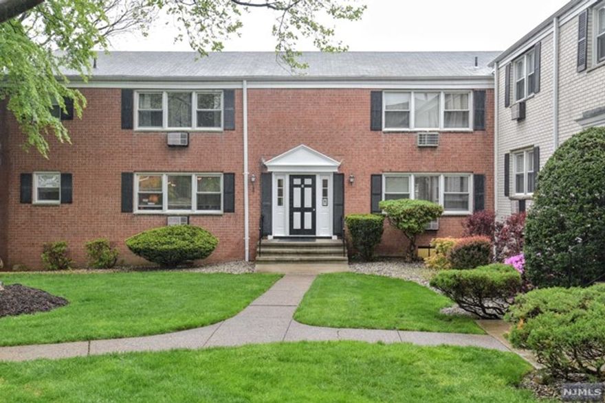 This Beautifully updated first floor unit on a private cul-de-sac is showered with natural sunlight. The hardwood floors have been refinished and add to the richness of the home. There is an updated kitchen with new cabinetry, quartz counter tops and appliances. There are los of closets and two storage units in the basement along with laundry. Pool in complex assigned parking is directly behind the home and abundant amount of guest spaces.