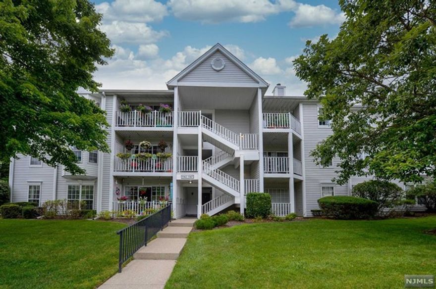 Come and relax in this beautiful community of Society Hill. This condo is nestled up on the third floor and offers pretty views from all the windows. Separate dining room and living room with sliding doors where you will enjoy a relaxing deck. Full bath plus laundry room down the hall. There is a main bedroom with private bath and one more nice sized bedroom. Within walking distance to the clubhouse, tennis and pool. Includes storage closet in hall. There is assigned parking plus additional ample guest parking. Close to NYC trans., parks, hiking, skiing, shopping & dining. High rated schools and low taxes! Great investment opportunity or make this condo your home!