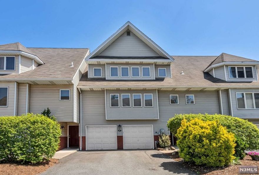 Fully renovated townhouse with upgraded bathrooms, kitchen,heating and AC units. Spacious Great Room with Fireplace, high ceiling and a lot of windows overlooking the deck. Eat-in kitchen and dining area with walk-in pantry provide ample space for culinary delights and storage. On this level you have a bedroom with full bathroom. Top floor offers spaciuos Master bedroom with a walk-in closet, 3rd bedroom with bathroom and laundry. The finished basement and attached oversized two-car garage provide additional convenience and space. Outside, a lovely deck awaits, offering the perfect spot to enjoy the fresh air and sunshine.Conveniently located near schools, transportation to NYC, two train lines, bus and Glen Rock Downtown.