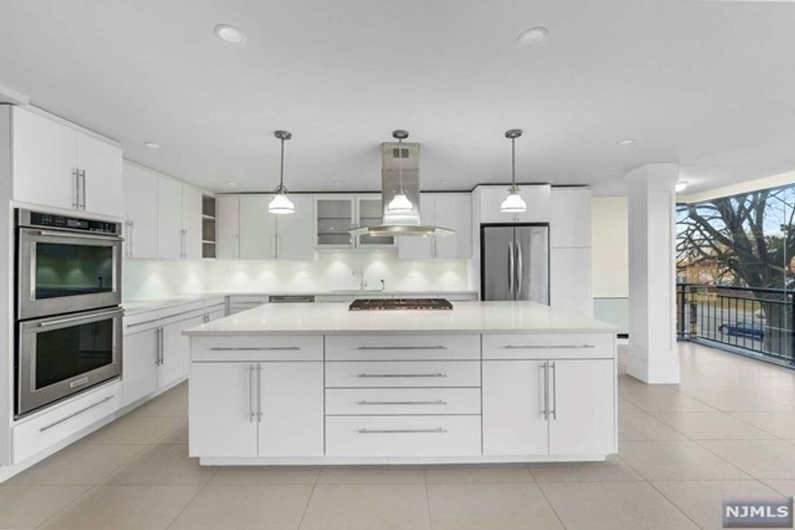 This elegant one of a kind down-split corner and end unit, with its river & NYC views features a welcoming entry to the dramatic living room. The floor to ceiling windows drench the room with natural light. The master bedroom on this level with a sitting room offers a private bath and large walk-in closet & home office. Step down to the eat-in kitchen with gorgeous quartz countertops. The center kitchen island features a gas cooktop with ventilation. All completely updated appliances including double wall ovens. The kitchen & dining room are open to each other, making this a great spot for family and friends to gather. A second master bedroom is on this level. The master bath features a steam shower. The third bedroom is light and bright and offers river views. The powder room en suite completes this level. Ample storage space throughout. The outdoors are defined as 28 acres of manicured park like grounds. 24 hour security,doorman, basketball&tennis courts, 2 pools, exercise room