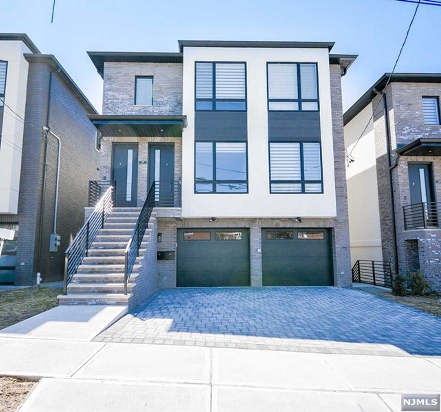 Brand new! 1st FLOOR OF 2 Family home . Open layout, Custom kitchen with stainless steel appliances, Quartz Countertops, Trex Decks and custom blinds. Master suite, 2 additional bedrooms. Lots of Custom Closet Organizers . Custom woodwork, Solid oak hardwood floors, Radiant heat Porcelain floor on all bathrooms and entire ground level. Navien High efficiency, High output, High performance Boiler and many more features. Close to major highways and NYC transportation.WALKING DISTANCE TO NYC BUS STOP.