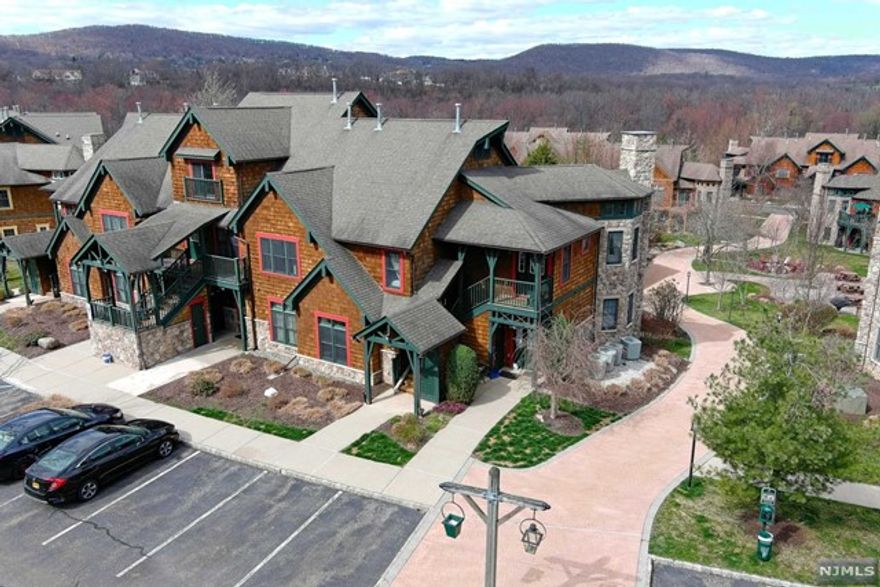 A serene home within the stunning Black Creek Sanctuary. This meticulously crafted residence boasts 7 rooms, including 3 bedrooms, 2 full baths, a laundry/utility room, fireplace, beautiful hardwood floors & an extra storage ski closet outside. Upon entry, bask in the open, airy ambiance enhanced by vaulted ceilings in the living room & primary bedroom. Natural light floods the space, inviting you to unwind & relax on the balcony amidst picturesque views of the Glenwood Mountains and tranquil courtyard. There is array of recreational amenities at your doorstep. Take advantage of the two pools, a year-round hot tub, firepit, basketball court, a private pond for canoeing, fishing & enchanting hiking trails! All enclosed in this private and picturesque community steps from Mountain Creek and all it has to offer year-round. Whether seeking adventure or tranquility, this home offers an unparalleled lifestyle in a breathtaking setting, also short term rentals, Airbnb/ VRBO are approved.