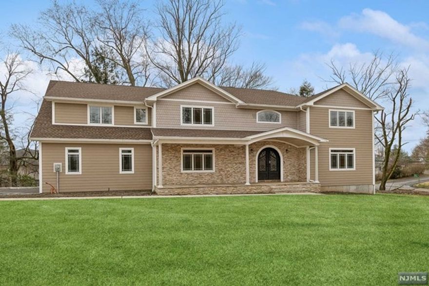 Welcome to this stunning new construction home located on a private cul-de-sac. With 5 bedrooms, 6 full baths, and 1 half bath, this home offers ample space for modern living. Step into the two-story entry foyer, setting the tone for the grandeur that awaits. The main level features a living room, dining room, powder room and a spacious great room that looks into the gourmet kitchen which is perfect for entertaining. A bedroom with a full bath complete this level. Upstairs, the master bedroom suite provides a private oasis, while 3 additional bedrooms each offer their own baths and comfort. Laundry is also conveniently located on this level. The finished basement adds to the allure of this home, with a recreation room, theatre, and another full bath, providing endless possibilities for entertainment and relaxation. Don't miss the opportunity to make this exquisite home yours.