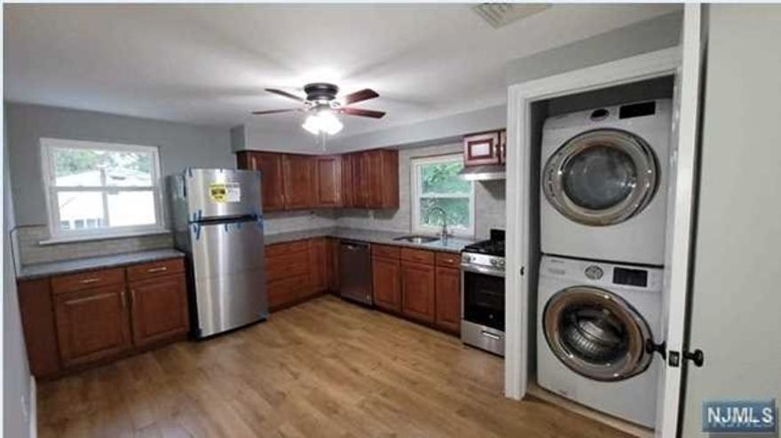 FULLY RENOVATED 2021-second floor apartment. One floor living with eat-in kitchen boasting stackable laundry in closet, living room w/ hardwood fl, bathroom, primary bedroom with large closets. Second bedroom with double door closet as well. (New carpet installed in bedrooms 2/23) 2 driveway parking spots. Hot water, lawn maintenance & snow removal included. No pets. A MUST SEE!! YOU WILL LOVE LIVING HERE!!