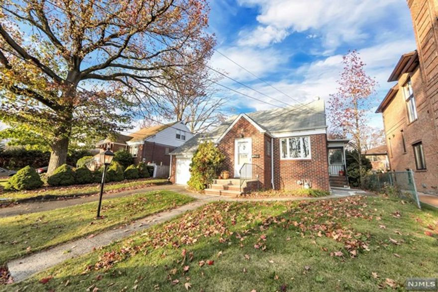 Right off of the prestigious Abbott Boulevard, this renovated 3 bedroom home offers a newer kitchen, hardwood floors, attached garage and a fenced and private backyard. With easy NYC express transportation, this location can't be beat.