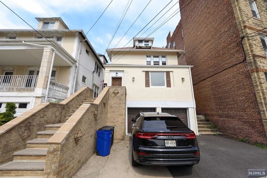 Don't miss this fully updated duplex 4 bedroom/3 bath in Cliffside Park. Walk right into your eat in kitchen featuring stainless appliances and granite countertops. This unit has 4 large bedrooms, 3 full bathrooms and indoor parking along with central AC and a private paver patio backyard. Laundry in UNIT! Extra space available as well in basement (additional charge). Schedule your private viewing today!