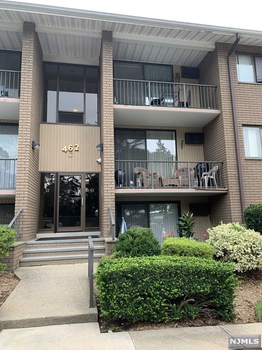 Pristine second floor condo. This one bedroom unit offers a dining area with tile floors, a storage closet. The dining room is open to the kitchen, that has beautiful cabinets, stainless steel appliances, granite, and a breakfast bar with seating for two. The living room is a good sized, with carpeting, and access to a deck. The bathroom has plenty of counter space and cabinets. The bedroom is large with two closets, and carpeting. The unit is bright and airy, and crown molding through out the unit. The laundry is on site , just one floor down. Two parking spots not assigned.