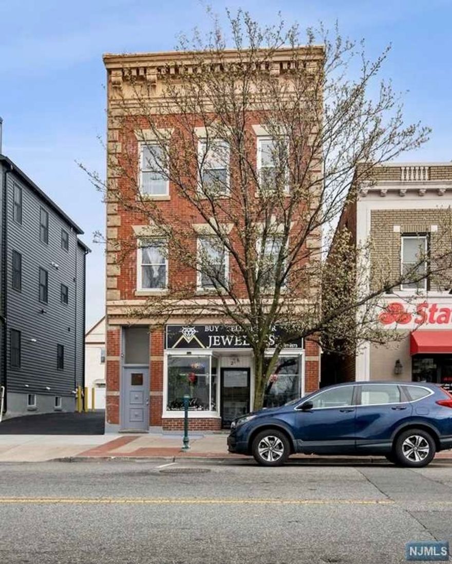Nestled on the vibrant main street of Kearny, this property offers unparalleled visibility and accessibility in the heart of the community. This versatile property encompasses a blend of commercial and residential spaces, offering a unique investment opportunity. With one commercial unit and three well-maintained residential apartments. All four rental units are currently leased, providing a steady and reliable income stream. Property is located 6 minutes from Harrison Path station, public transportation is right on the corner and it's close to shopping and West Hudson Park!