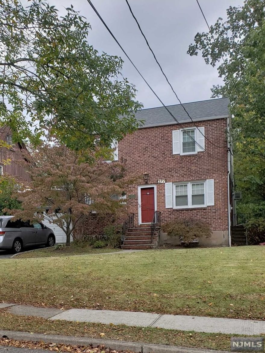 great rental available in west englewood section of teaneck. Large formal lr, dining room,updated kitchen with breakfast bar overlooking enormous family room which exits to deck and large, fenced, flat yard. 3 bedrooms and full bath upstairs. A portion of the garage will be retained for tenants use. Fireplace cannot be used. Garage is attached but no entrance from house. hardwood floors. large backyard close to all. room to the right when you walk in... house is not available until May 6,2024