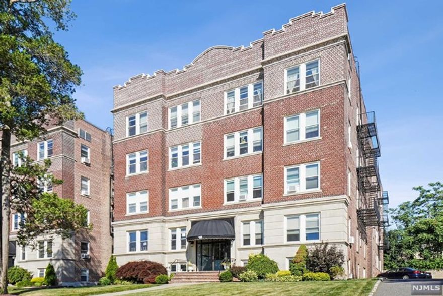 Unique Soho like lower level corner unit in downtown Montclair location near the new Arts Center, the Montclair Art Museum, Whole Foods, a myriad of fabulous dining options, and shopping like no other. Renovated kitchen features stainless steel appliances, granite countertops, dishwasher, microwave, and moveable center island. Renovated bath with beautifully tiled walk-in glass shower. High ceilings, engineered wood floors, and track lighting round out this light-filled space. Bedroom has 2 closets. Convenient to NYC transportation and so much more. Private entrance through laundry room side door. Window AC and kitchen island included with unit.