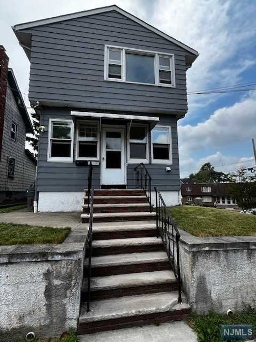 Great opportunity to live in East Rutherford and get in and out of NYC in a jiffy! With mass transit options just steps away, this delightful apartment is in a prime location. Freshly painted walls and brand new carpeting make this sparkling-clean apartment ready for a new occupant. The eat-in kitchen offers a gas range, refrigerator, and plenty of cabinets and counter space. The bedroom offers a den/office, and the oversized living room has a walk-in closet. Need storage? There's a walk-up attic to accommodate all your extra things. Credit check through NTN or InsideCredit and interview required. Tenant responsible for first $150 of repairs. Rental insurance required. NO PETS.