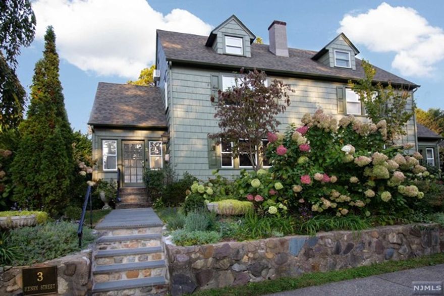 Discover this newly renovated home beyond the blossoms with three levels of living space and a full basement. A bright white vestibule introduces a new powder room, large open living room and dining room highlighted by a gorgeous new kitchen. The newly designed kitchen offers all of the heart's desires with tall white cabinetry, white quartz countertops, and stainless steel appliances. Hardwood flooring throughout the home with the third floor offers a plush carpeted retreat for a bedroom or office. Access a basement from 1st flr with laundry can accommodate home gym equipment, playroom activities and lots of storage space. Enjoy all that Glen Rock has to offer with top ranking schools, a town center, a town swimming pool, a stunning Arboretum, and so much more. This home is located only a few blocks from Ridgewood's bustling town center, NJ transit trains or buses, and selection of boutiques and restaurants. Call Christine201- 819-6413