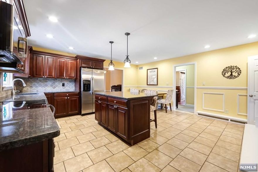 BEAUTIFUL, WELL MAINTAINED, RENOVATED 1ST FLOOR UNIT, LIVING ROOM, KITCHEN/DINING ROOM COMBO, MASTER BEDROOM WITH BATH, PLUS 3 BEDROOMS AND MAIN BATH, HARDWOOD FLOORS, 2000 SQUARE FEET OF LIVING SPACE, WASHER/DRYER IN UNIT, PRIVATE BACKYARD WITH PAVER PATIO AND POOL, DRIVEWAY FOR PARKING, LANDSCAPING & SNOW REMOVAL INCLUDED, CENTRAL AIR, SEPARATE UTILITIES. NEAR MAJOR HIGHWAYS, SCHOOLS, BORDERS SADDLE BROOK COUNTY PARK. TENANT APPLICATION, CREDIT/BACKGROUND CHECK, INTERVIEW AND PROOF OF INCOME REQUIRED.