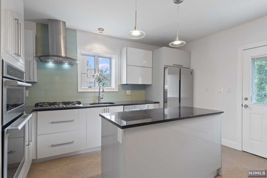 Cozy 3 Bedroom Apartment for Rent in Lodi, NJ. Located on the first floor of a beautifully updated multi-family home, this charming 3-bedroom, 1-bathroom home offers both comfort and convenience in a prime Lodi location. The home features three spacious bedrooms with large closets, modern updated bathroom, and a modern eat-in-kitchen, and in-unit combo washer/dryer. Driveway with two designated parking spots is included. Utilities are paid separately, with water included. Very large backyard with gazebo, and gardening area. Pets will be considered on a case-by-case basis for an additional monthly fee. This apartment is situated in a friendly neighborhood with easy access to local shops, restaurants, and parks. It is ideal for professionals, small families, or anyone looking for a cozy and convenient place to call home. Don't miss out on this fantastic rental opportunity!