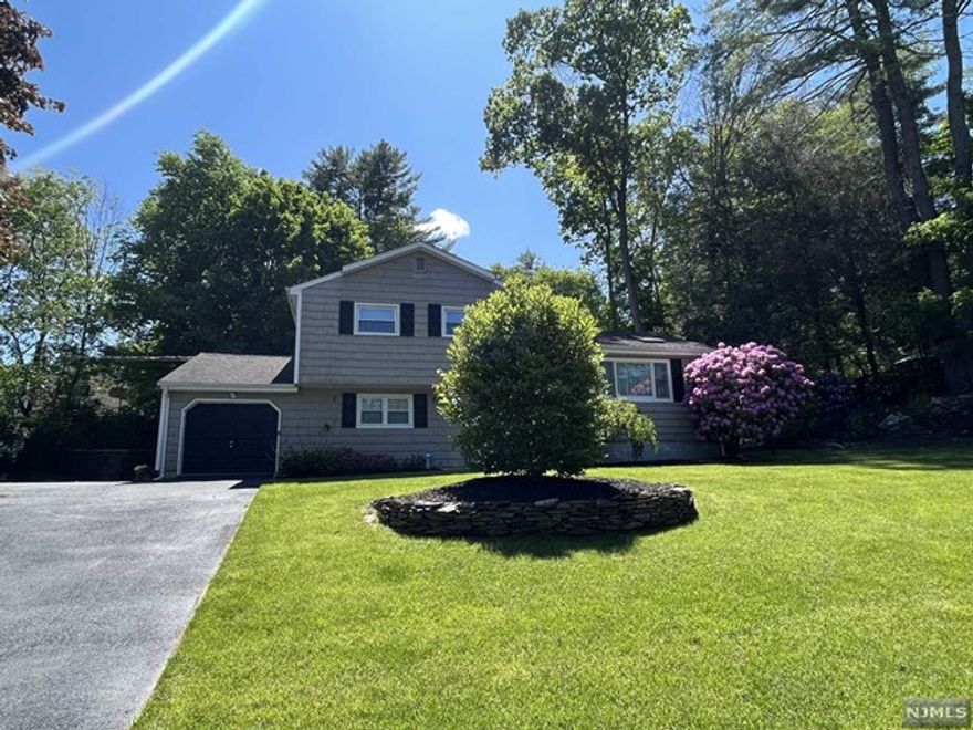 This gorgeous corner Sugar Maple split in pristine condition on a tree lined quiet street is awaiting amazing tenants and or tenant to enjoy the picturesque property and care for it as the landlord has done. The home boosts three bedrooms and one and one half baths. It has beautiful granite counter tops, custom cabinets, stainless steel appliances, and a tile floor. The rest of the home has lovely dark wood flooring throughout, central air conditioning, a vaulted ceiling with skylights in the living room which captures an abundance of natural light! The property also has a sliding glass door from dinning area to the deck and an attached deep one care garage. The amazingly beautiful private backyard is fully fenced in and has a large wood deck for entertaining and BBQ's! Please no pets, NTN, credit of 700 +, and interview required by landlord. All landscaping and snow removal the sole responsibility of tenant as well.